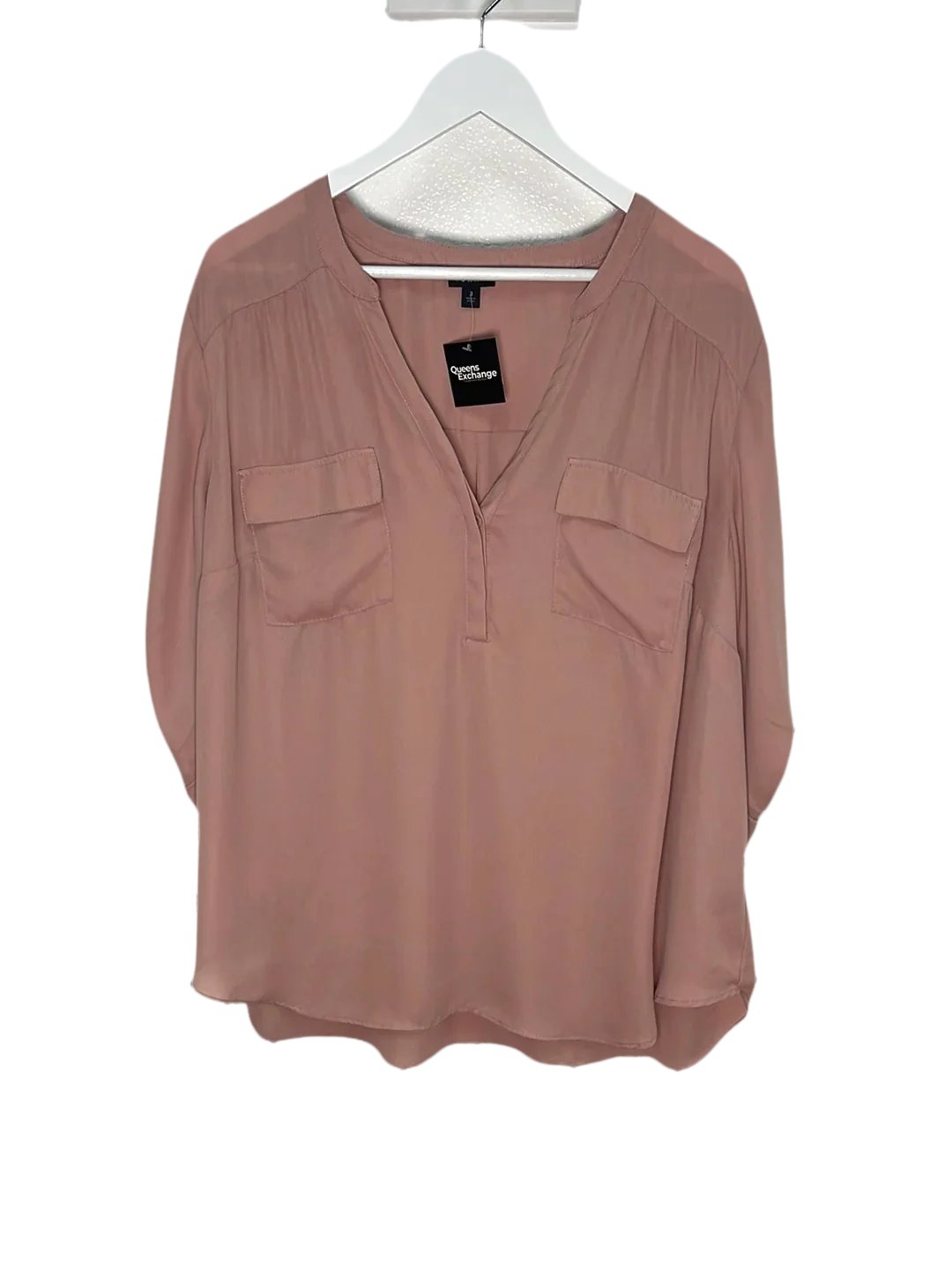 http://www.consignqueens.com/cdn/shop/products/torrid-harper-dusty-blush-pullover-blouse-3-224880.jpg?v=1695363863